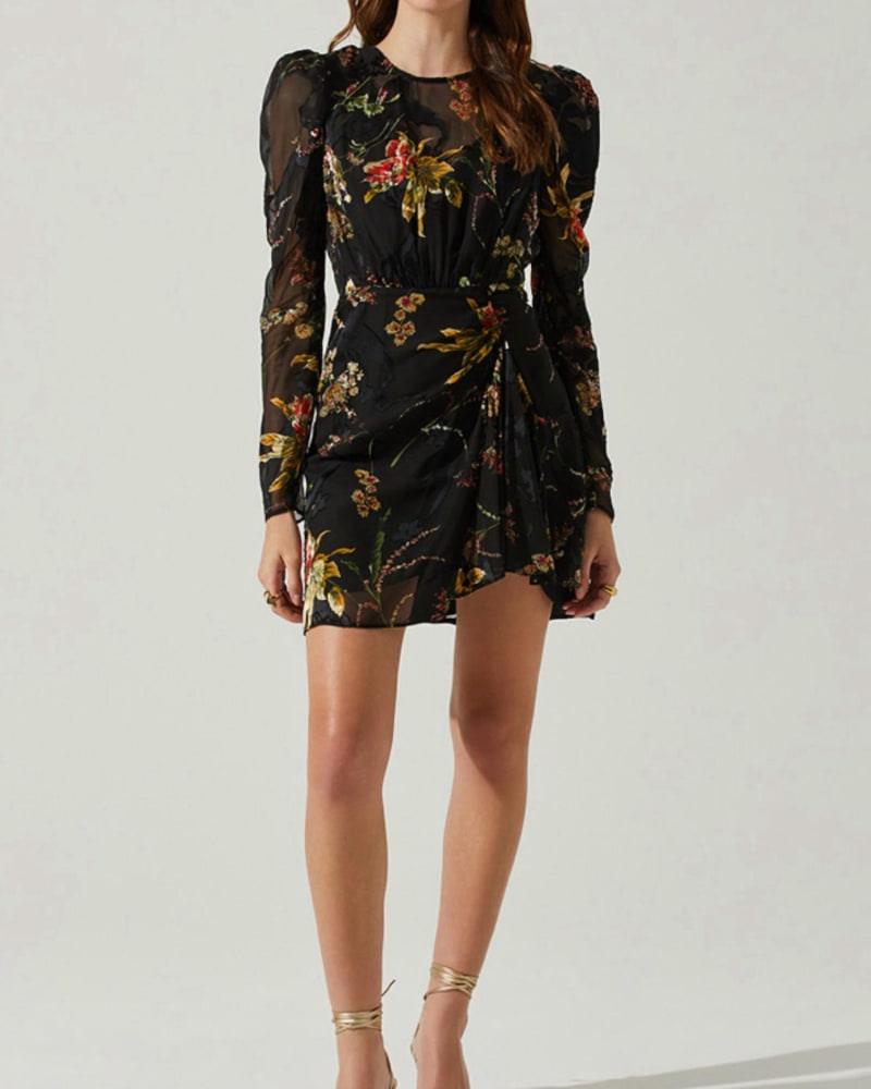 Front of a model wearing a size L Cindy Dress In Black Orange Burnout in Black Orange Burnout by ASTR. | dia_product_style_image_id:344613